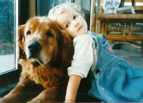 Picture of Child and Golden Retriever